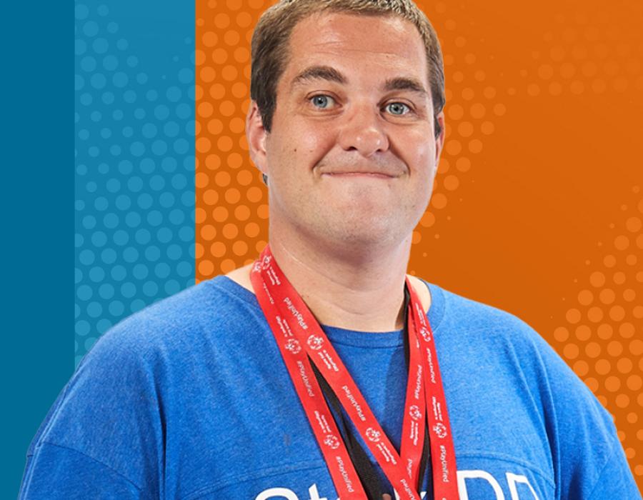 Young man with medals around his neck