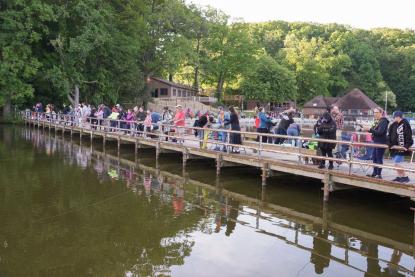 people fishing on a dock
